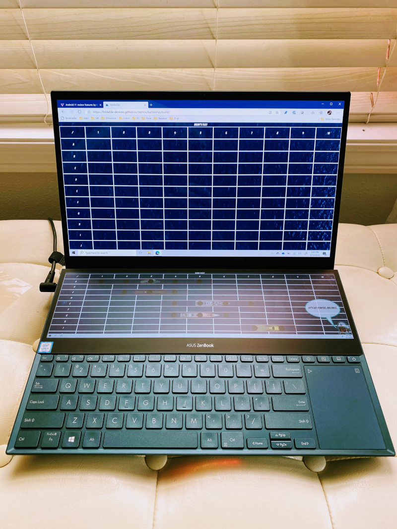 picture of a Asus Zenbook Pro Duo running Battleship demo game